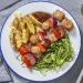 BBQ Sausage Skewers with Cheesy Chips and Rocket Salad Recipe