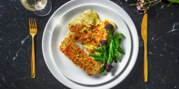 Herb Crusted Salmon with Cheesy Dauphinoise, Purple Sprouting Broccoli and Sugar Snaps Recipe