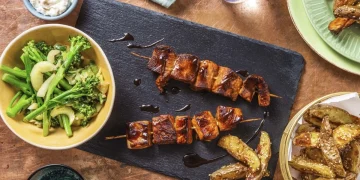 Salmon Teriyaki Skewers with Miso Stir Fried Greens and Sesame Wedges Recipe