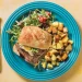 Steak Sandwich and Fried Potatoes with a Mustardy Rocket and Tomato Salad