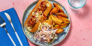 BBQ Glazed Sausages in Buns with Onion Crumb, Roasted Garlic Slaw and Wedges Recipe